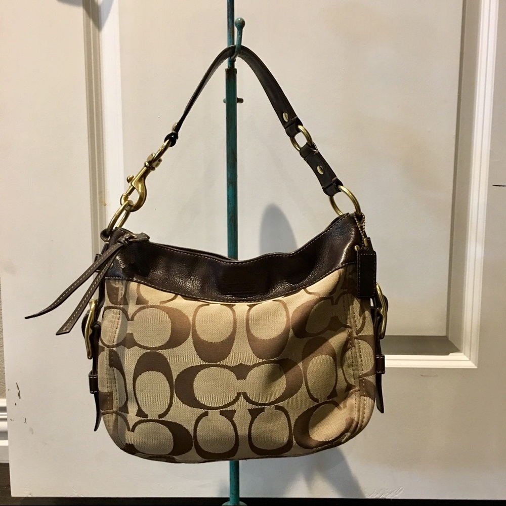 Coach canvas hobo style purse.